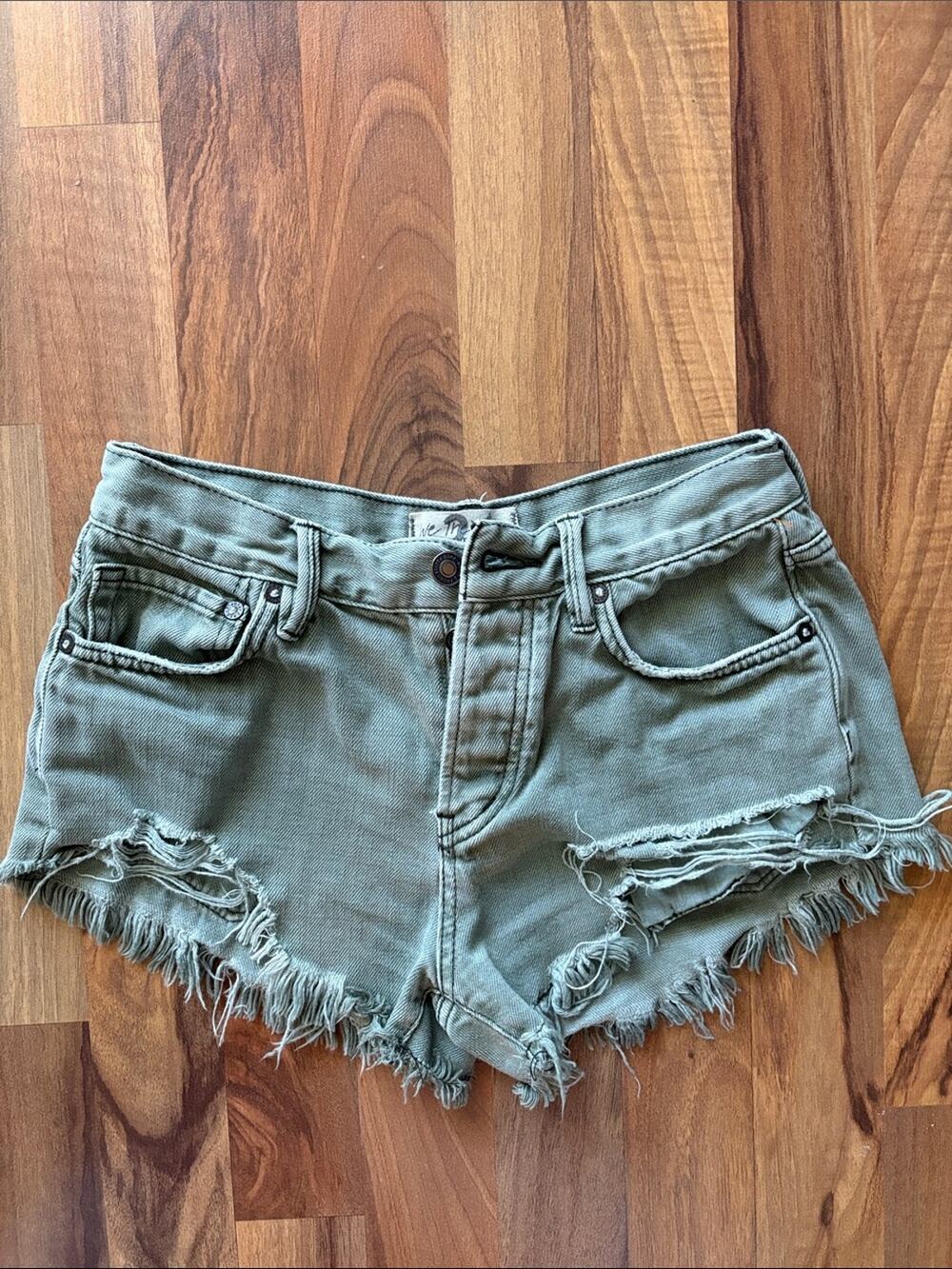 We The Free Olive By Free People Green Distressed Denim Cutoff Shorts Size 24